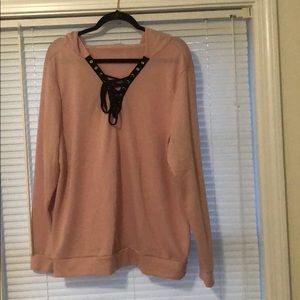 Light pink colored sweater